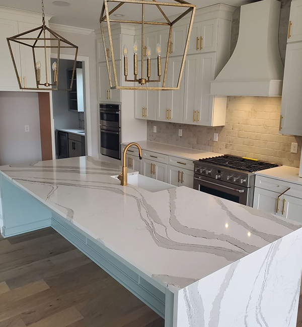 Modern kitchen interior with stylish countertops and cabinetry