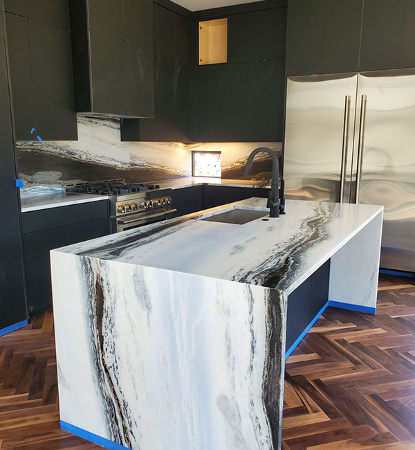 Marble kitchen countertops with elegant veining and polished finish